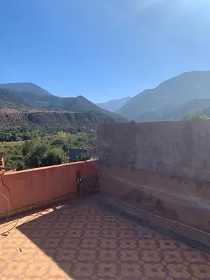 a balcony with a view of the mountains at Maison d'hôtes au pied du grand Atlas- Asguine- Ourika in Asguine
