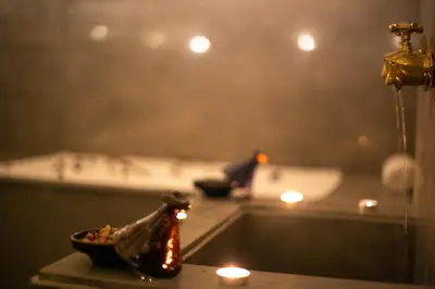 a room with candles and a bowl of food on a counter at Riad Al Makan Fes & Spa in Fès