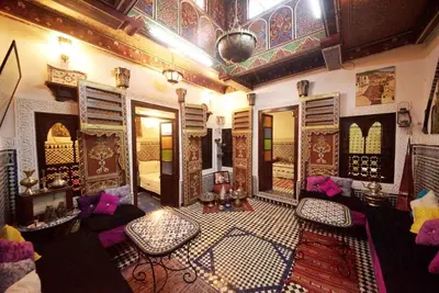 a living room filled with lots of furniture at Dar Chourouk in Fès