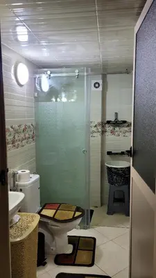 a bathroom with a shower and a toilet and a sink at Charme & Confort au Cœur de Meknes in Meknès