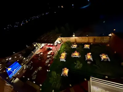 an overhead view of a restaurant at night at Riad Sahara Stars Dades in Boumalne