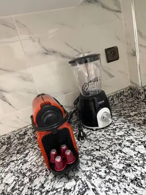 a blender sitting on top of a counter at Family confort Fes in Fès
