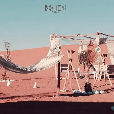 a hammock in the middle of the desert at Bohem Camp in Merzouga