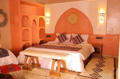 a bedroom with two beds in a room at Riad Dar Susan - Authentic Stay in Zagora in Zagora