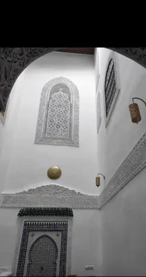 a building with a window on the top of it at Riad Averroès in Fès