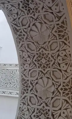 a close up of a ceiling with a flower pattern at Riad Averroès in Fès