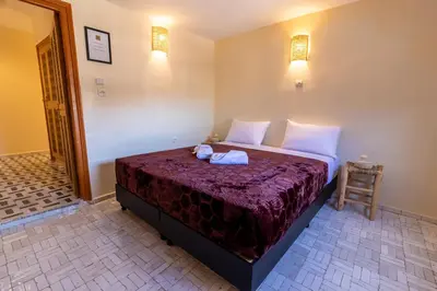 a bedroom with a bed in a room at Riad Batha in Fès