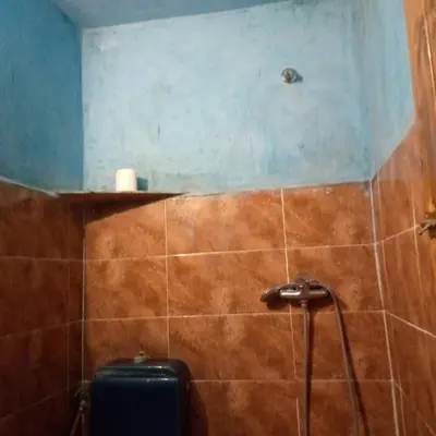 a bathroom with a shower with a toilet in it at Dar adiafa dar asalam in Aït Ben Haddou