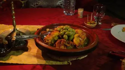 a bowl of food sitting on a table at Kasbah Itrane in Tamnougalt