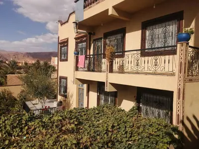 a building with balconies on the side of it at Dar Latifa in Tinerhir