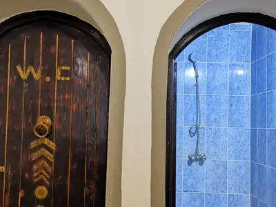 a door and a window in a room at Kasbah Ziwana - Guesthouse in Zagora