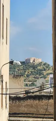 a view of a hill from a window of a building at Dawya terrace in Fès