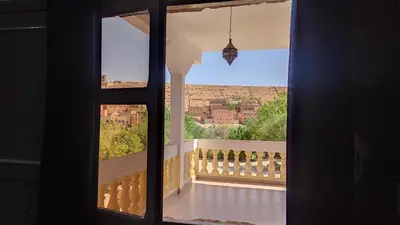 a view from a window of a balcony at Hotel camping le Soleil Tinghir in Tinerhir