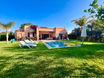 a house with a swimming pool in the yard at Entire villa with private pool in Marrakech in Marrakech