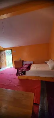 a bedroom with a large bed in a room at AYA Farm,Ferme d'hotes Aguelmous in Khenifra