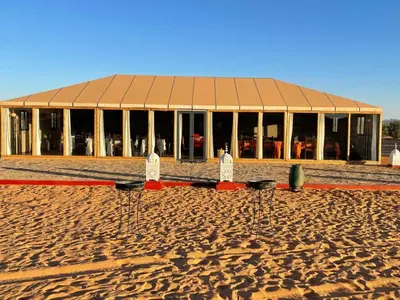 a building on the beach in front at Idir Luxury Camp in Merzouga
