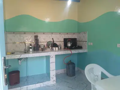 a kitchen with a sink and a counter at Studio avec cuisine - kitchen in Tinerhir