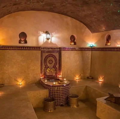 a room with a bath tub with lights in it at Villa pension complète Marrakech in Marrakech
