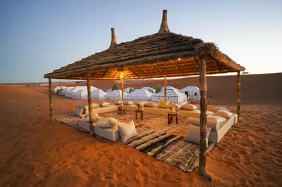 a pavilion in the middle of the desert at desert luxury merzouga in Merzouga