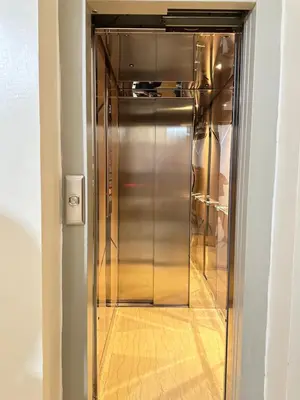 a stainless steel elevator in a room with a floor at Hood houses in Ouarzazate