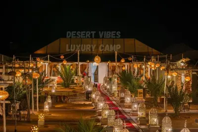 a bunch of lights in front of a luxury camp at Desert vibes Luxury camp in Merzouga