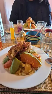 a white plate of food on a table at DAR DANI café restaurant in Boumalne