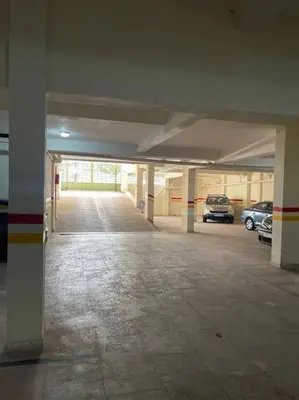 an empty parking garage with cars parked in it at Luxe & Air Conditionner & Calme appartement in Fès