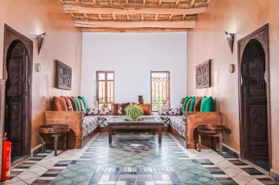 a living room with a couch and chairs at Kasbah Tiziri in Kalaat MGouna