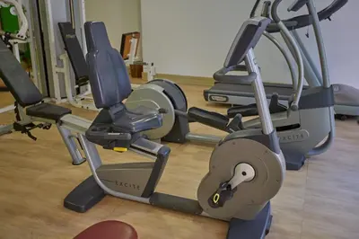 a gym with several tread machines in a room at Sliwa house la Perle de la ville Ocre in Marrakech