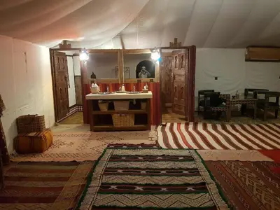 a room with a sink and a mirror in a tent at beduincamp in Hassilabied