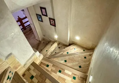 an overhead view of a staircase in a building at Riad Dar Timrad in Fès