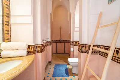 a bathroom with a sink and a toilet at Villa Izza in Marrakech