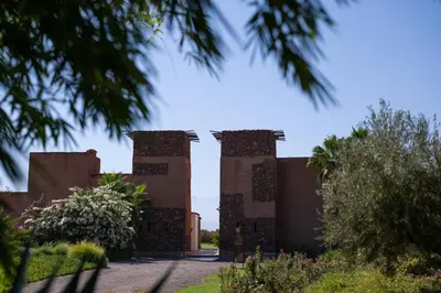 an old building with four towers on top of it at Dar Syada Boutique Hotel & SPA Marrakech in Marrakech