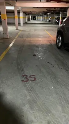 a parking garage with a car parked in it at Prestigia luxury home in Fès