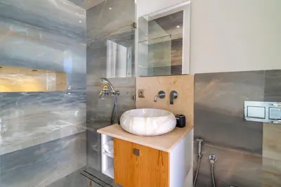 a bathroom with a sink and a shower at Villa Seyana master, piscine privée, sans vis à vis in Marrakech