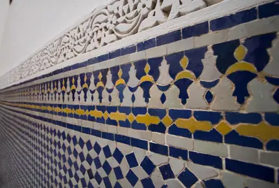 a close up of a blue and white tile wall at Dar Nejma in Fès