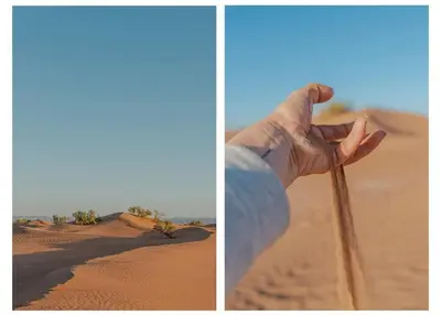 a hand holding a stick in the desert at Silent Camp in Mhamid