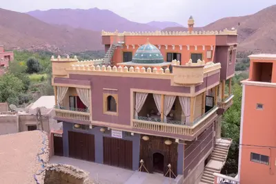 a building with a blue dome on top of it at RIAD TOUBKAL D'ATLAS TIFNOUTe in Imlil