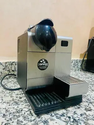 a coffee maker sitting on top of a table at Villa de la famille, with Private pool in Marrakech