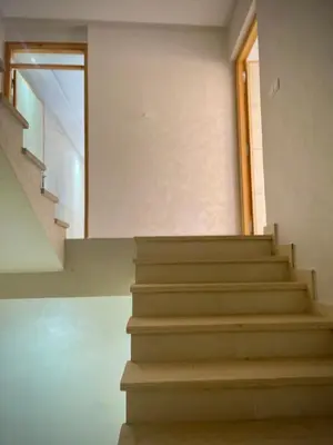 a staircase in a building with a stair case at MARRAKECH , Ourika in Ourika