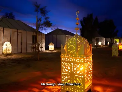 a yellow object with lights on it at night at Merzouga Camp Excursions in Merzouga