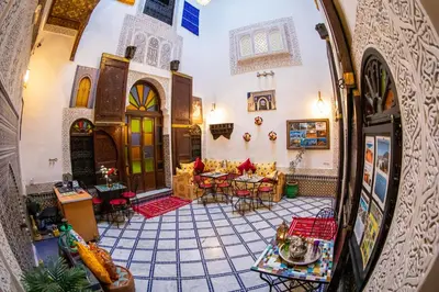 a view of a living room from the inside of a building at Riad LalaMoune in Fès