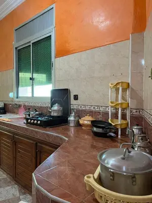 a kitchen with a counter top with a pot on it at Belo appart bassatine in Meknès