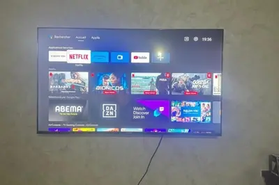 a television screen on a wall with a bunch of websites at Luxury Ifrane House in Ifrane