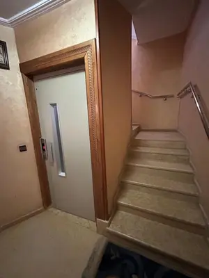 a stairway leading up to a door in a building at 800 Miles of Travel in Ouarzazate