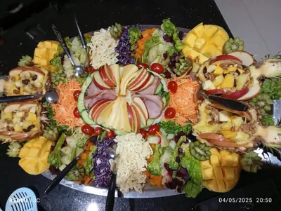 a plate of food with a bunch of different foods at Lina Village in Al Hachlaf