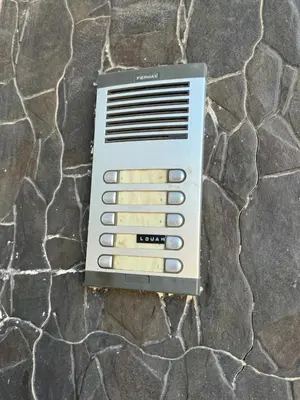 an electronic device sitting on top of a stone floor at Home louah in Fès