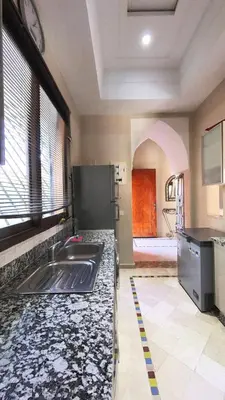 a kitchen with a sink and a counter top at Villa Belle vue - with a private & Heated pool in Marrakech