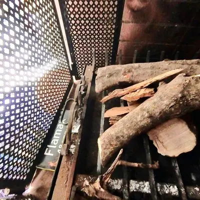 a pile of sticks on top of a grill at Villa Belle vue - with a private & Heated pool in Marrakech