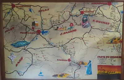 a drawing of a map on a wall at Ecolodge Le désert in Kasr Bounou